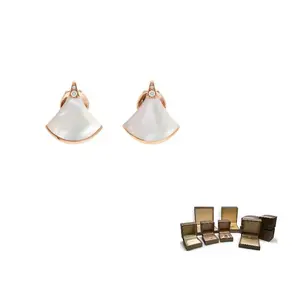 Алмазные серьги-гвоздики унисекс золотые BVLGARI