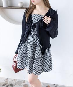 Длинный кардиган с оборками, связанный спицами.