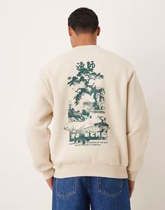 Свитшот свободного кроя с сувенирным принтом бежевого цвета Asos Design