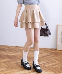 Двухъярусная мини-юбка с оборками и завязками на спине.