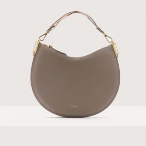 Сумка через плечо Coccinelle Sunup Large, цвет Warm T./Rosette