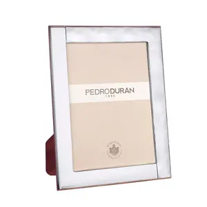 Pedro Durán Педро Дуран контрастирует с фоторамкой, серебро