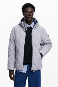 Огромное стеганое длинное пальто