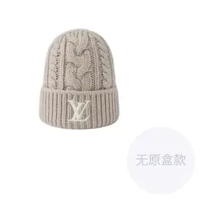 Шапка-бини из овечьей шерсти унисекс beige LOUIS VUITTON