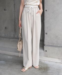 Брюки персикового цвета с двойной талией