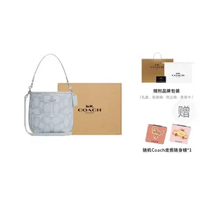 COACH Городская сумка-ведро из прорезиненного хлопка