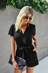 Эластичный комбинезон с поясом, глубоким вырезом и узлом по бокам Truedames