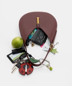 Сумка-хобо Cesia с металлическим акцентом Charles & Keith, цвет Wineberryred