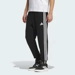 Брюки adidas Essentials Plus Regular Fit с тремя полосками, из французского махрового трикотажа, с манжетами.