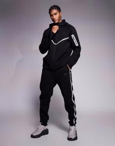 Светоотражающие спортивные брюки Tech Fleece черного цвета Nike