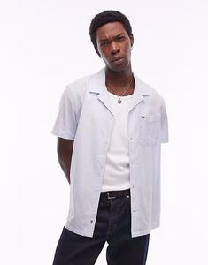 Льняная рубашка на пуговицах Tommy Jeans светло-голубого цвета