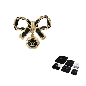 Металлический брошь AB8742 CHANEL