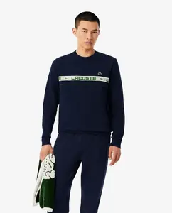 Мужская теннисная толстовка в полоску с черными фирменными деталями Lacoste