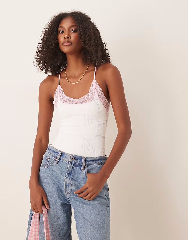 

Бесшовный топ-комбинезон Free People jules белого и розового цвета