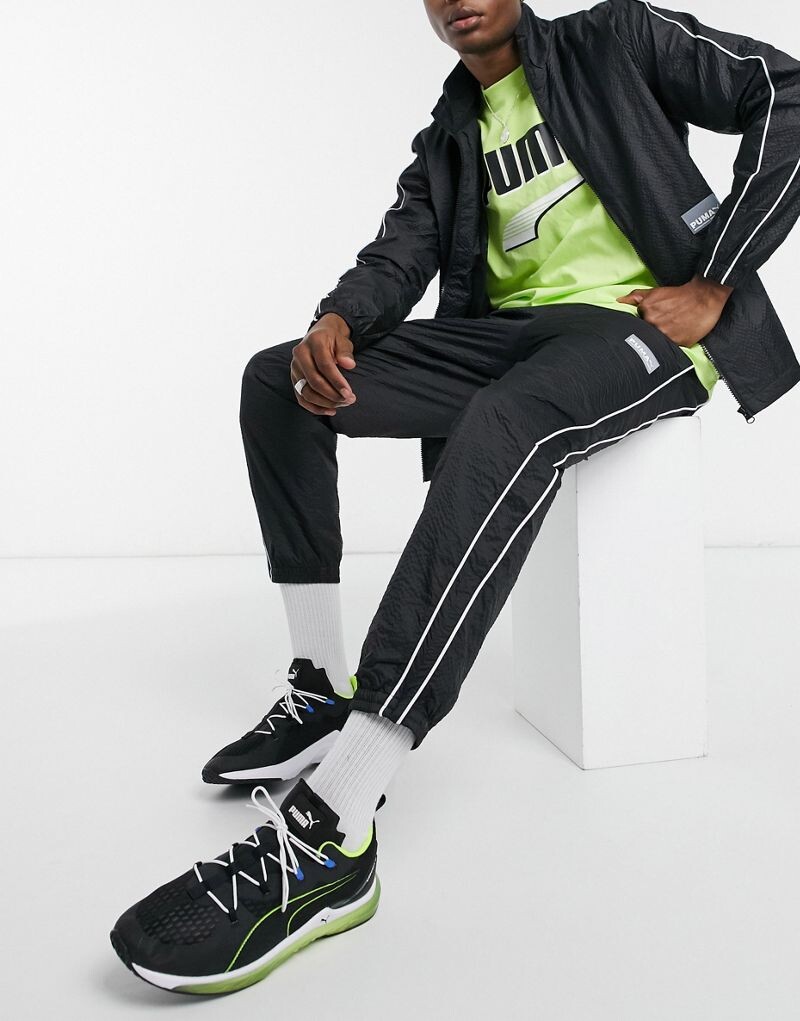 

Черные спортивные брюки с тканым логотипом Puma Avenir