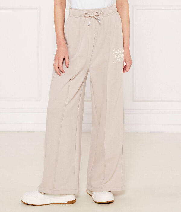 

Брюки Flare fit Calvin Klein Jeans, желтый