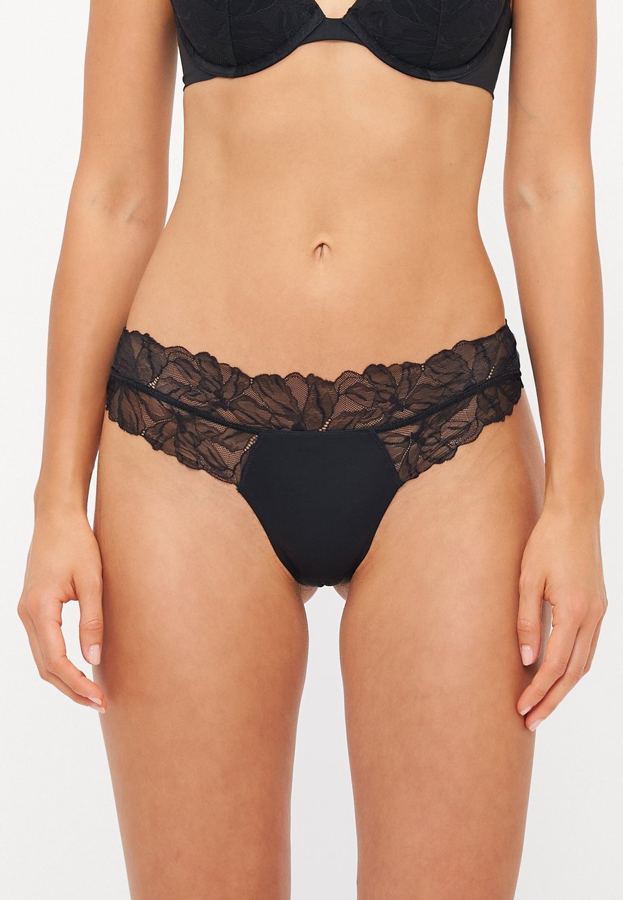 

Трусы Calvin Klein Underwear THONG PERFECTLY FIT , Black