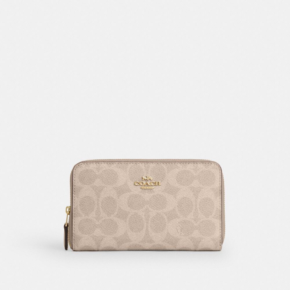

Средний кошелек с застежкой-молнией COACH, цвет gold/sand/chalk
