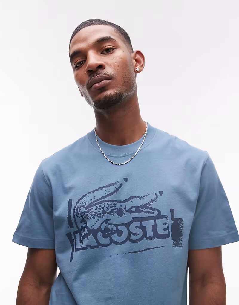 

Футболка свободного кроя Lacoste синего цвета с графическим принтом спереди