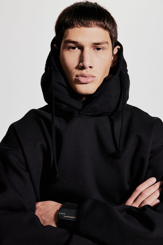 

Спортивная толстовка с капюшоном и надувным воротником H&M, черный