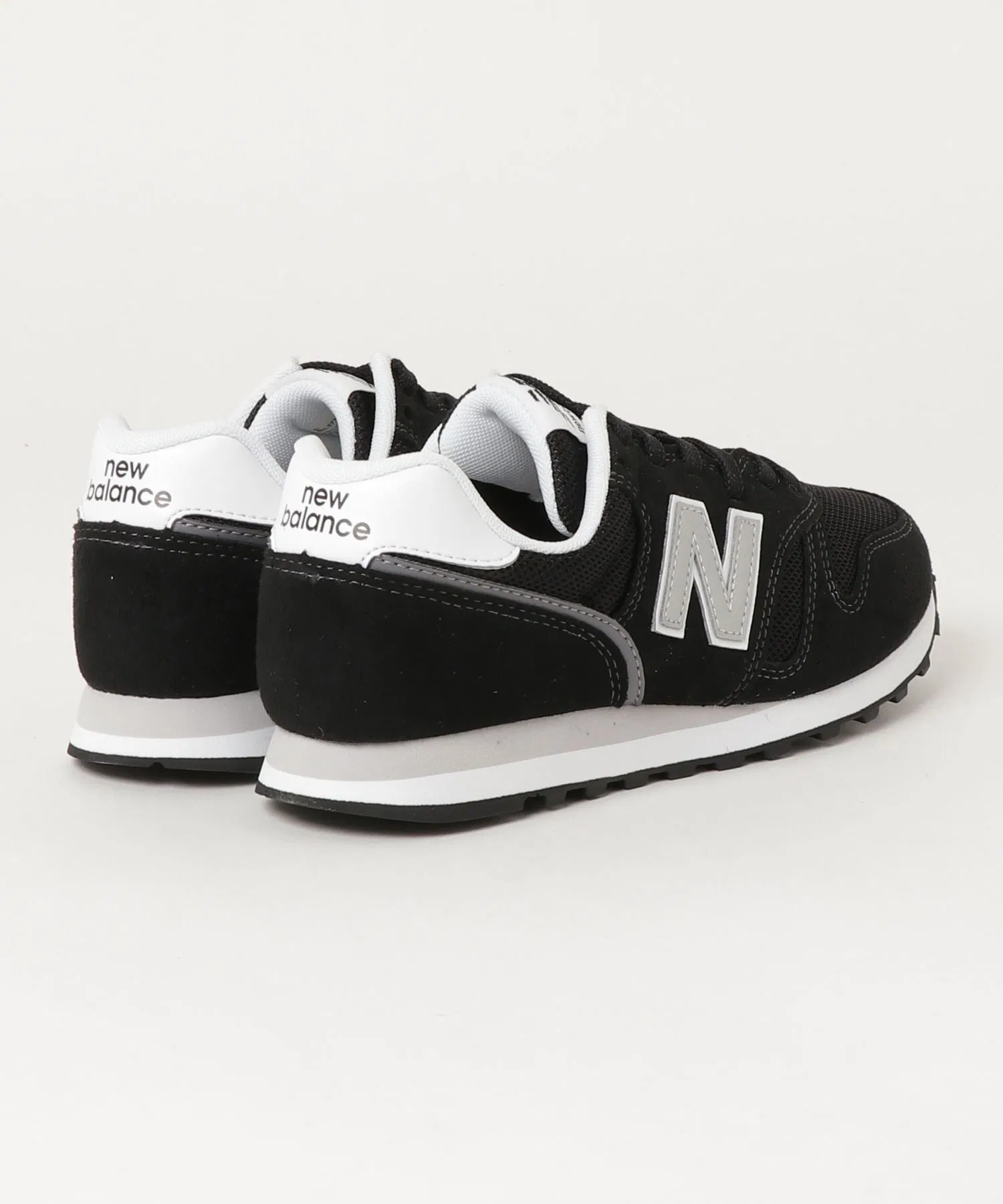 Унисекс кроссовки New Balance ML373 чёрно-белые — фото 2