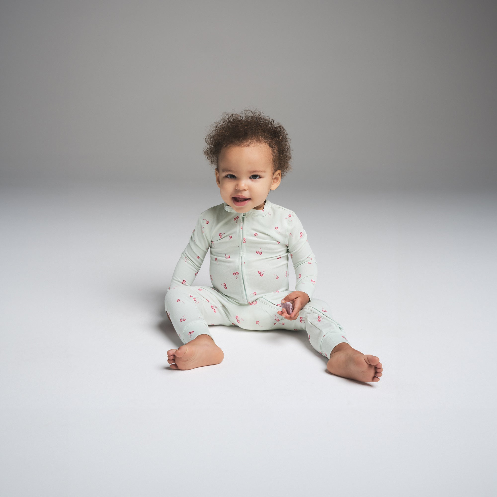 

Детский комбинезон SKIMS, цвет cloud cherry print