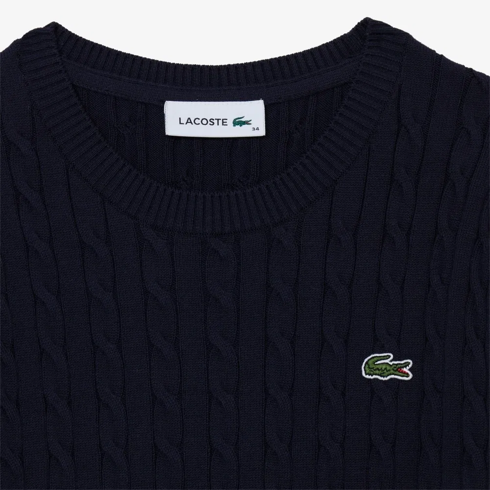 Женский синий вязаный свитер с коротким рукавом и круглым вырезом от Lacoste — фото 2