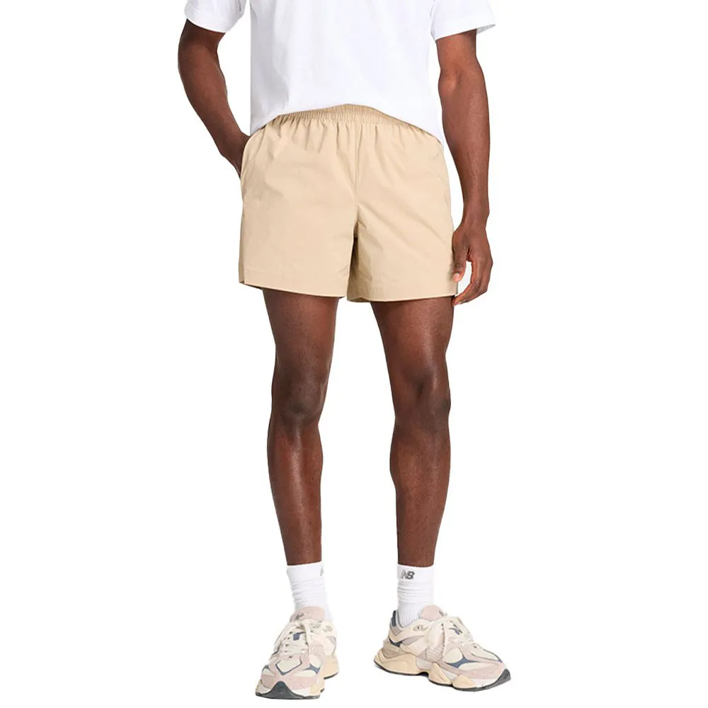 

Спортивные шорты New Balance Athletics Stretch 5´´, бежевый