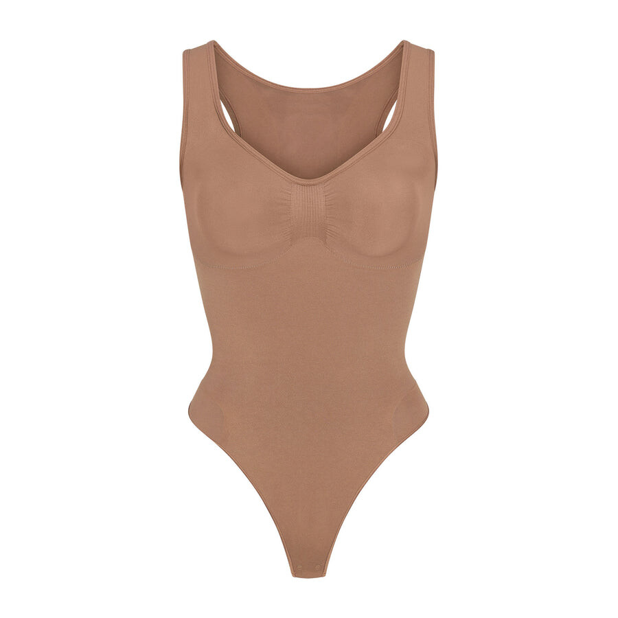 

Боди-стринги с круглым вырезом SKIMS Seamless Sculpt, цвет Sienna