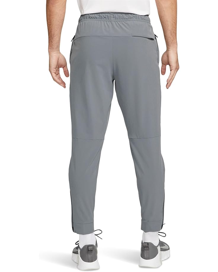 Брюки Nike Dri-FIT Unlimited Tapered Pants, цвет Smoke Grey/Black/Smoke Grey — фото 2