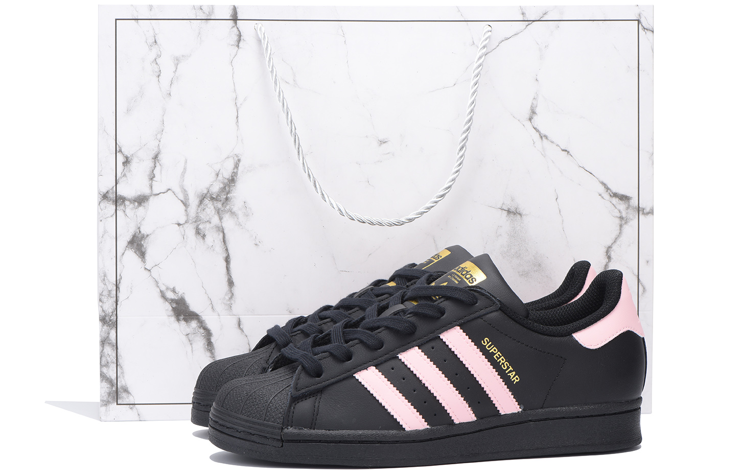 

Детские скейтерские кроссовки Superstar J Grade School Adidas Originals, черно-розовые