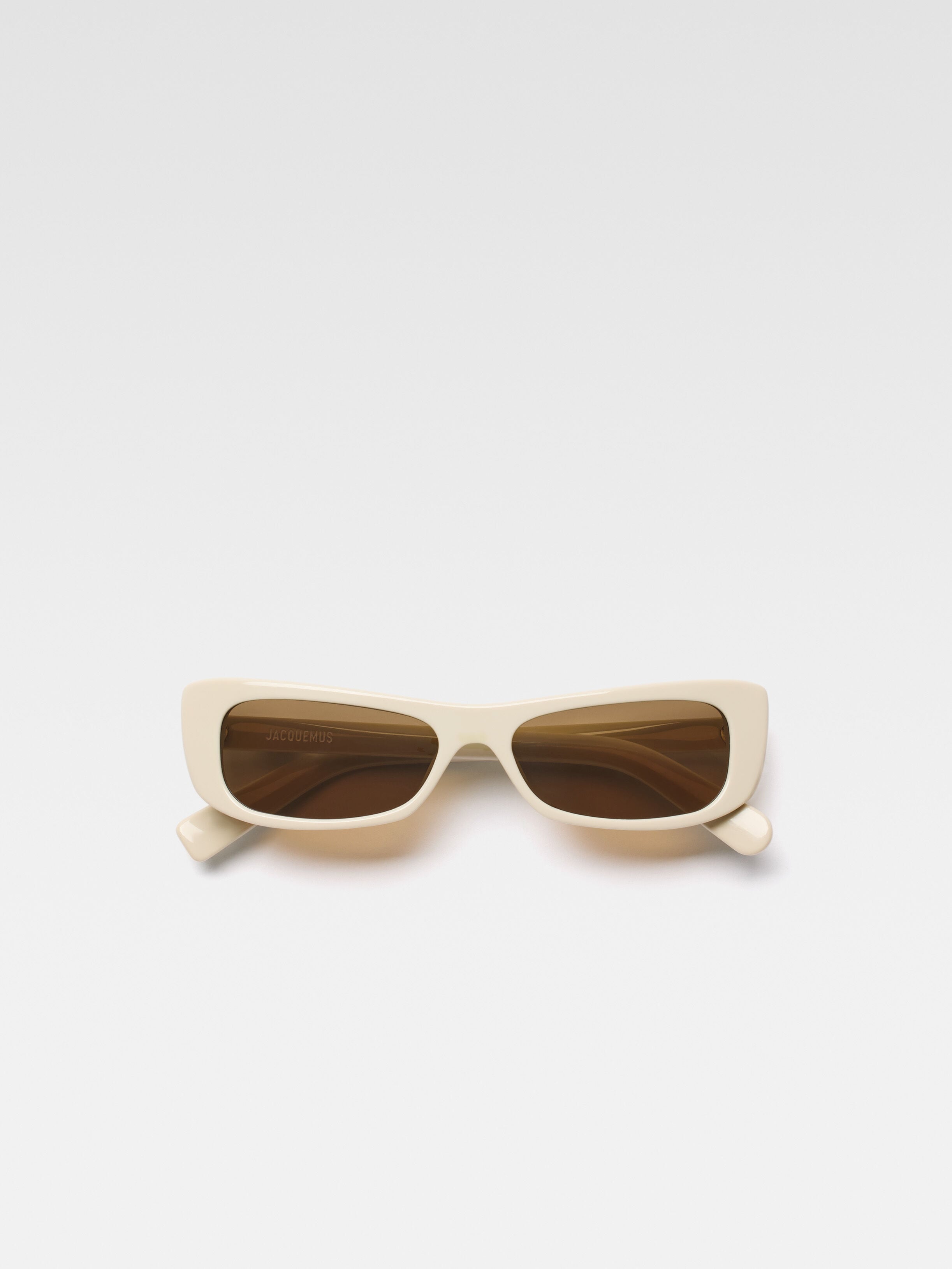 

Солнцезащитные очки «кошачий глаз» прямоугольной формы JACQUEMUS The Capri sunglasses, бежевый