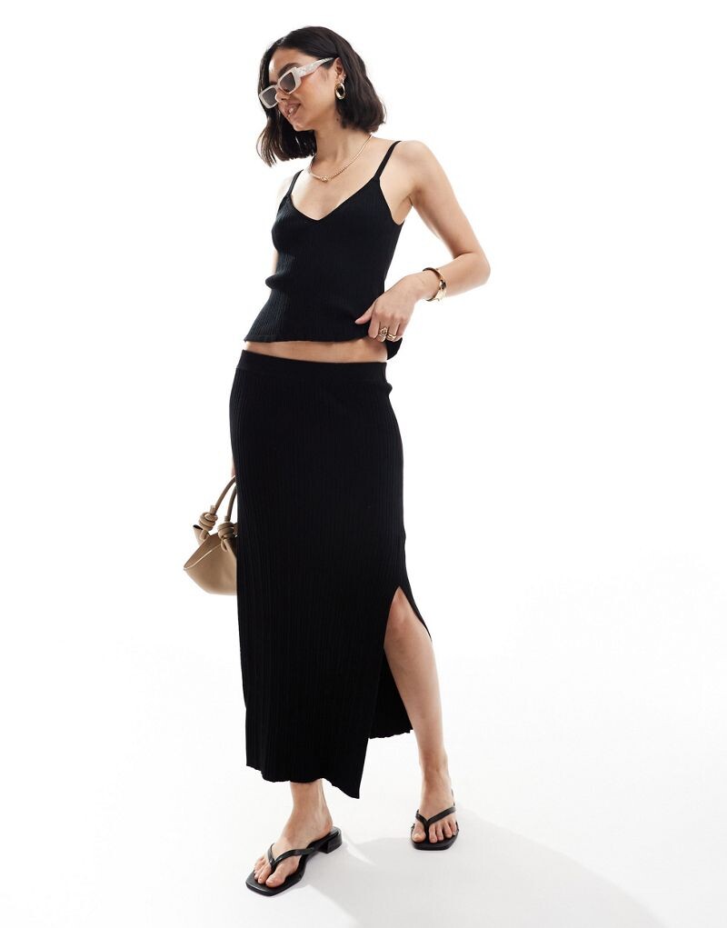 

Черная трикотажная юбка миди в тон ASOS DESIGN