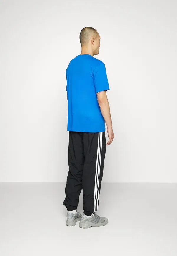 Спортивные штаны Firebird Adidas Originals, черный — фото 4