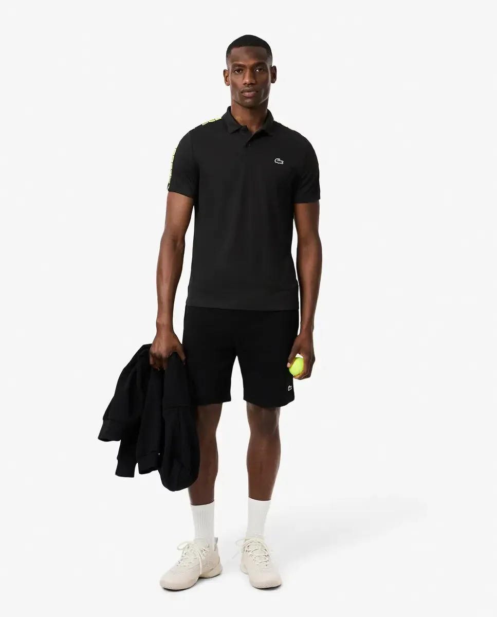 Мужская теннисная футболка поло с полоской от бренда Ultra-Dry с коротким рукавом Lacoste, черный — фото 4