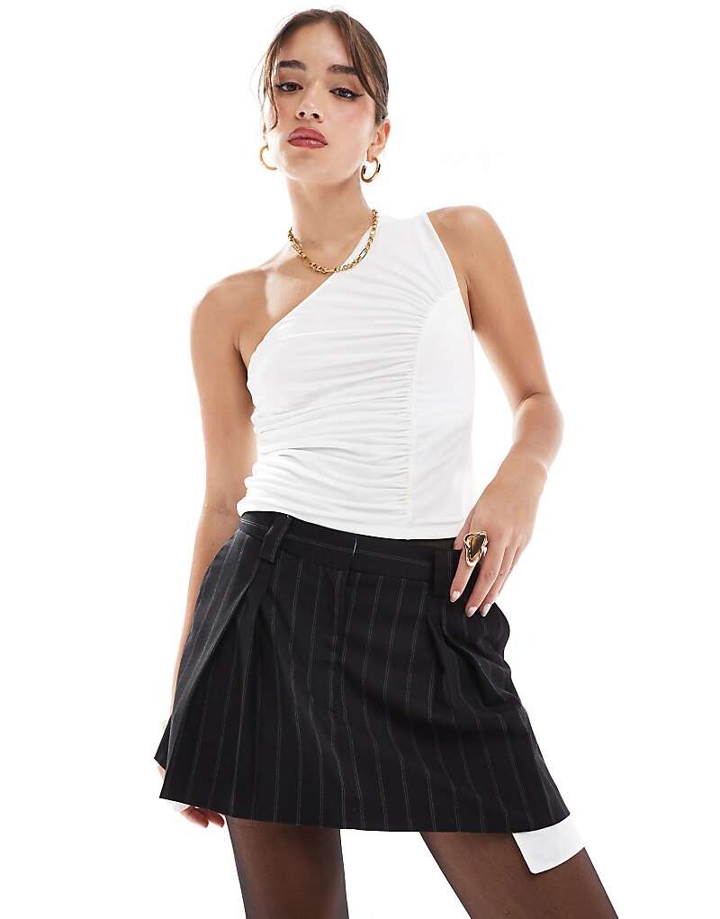 

ASOS DESIGN – Элегантная мини-юбка со складками в тон и расклешенным узором