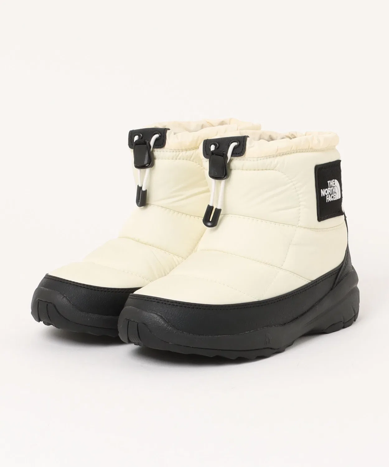 Детские зимние ботинки THE NORTH FACE K NUPTSE BOOTIE LOGO SHORT, 100% переработанный нейлон, белый