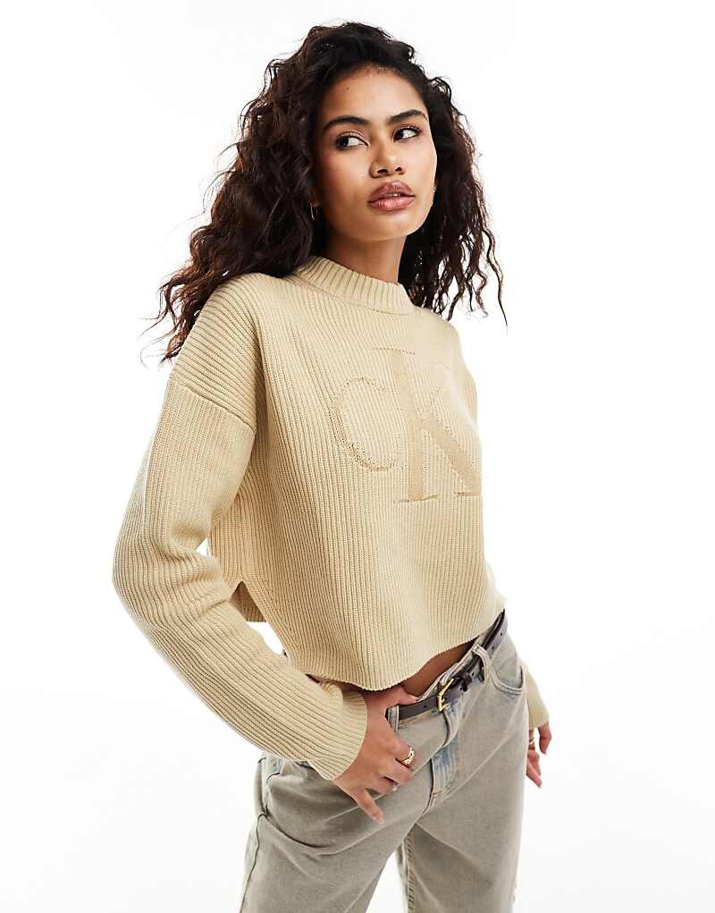 

Бежевый свитер Calvin Klein Jeans – с логотипом в тон
