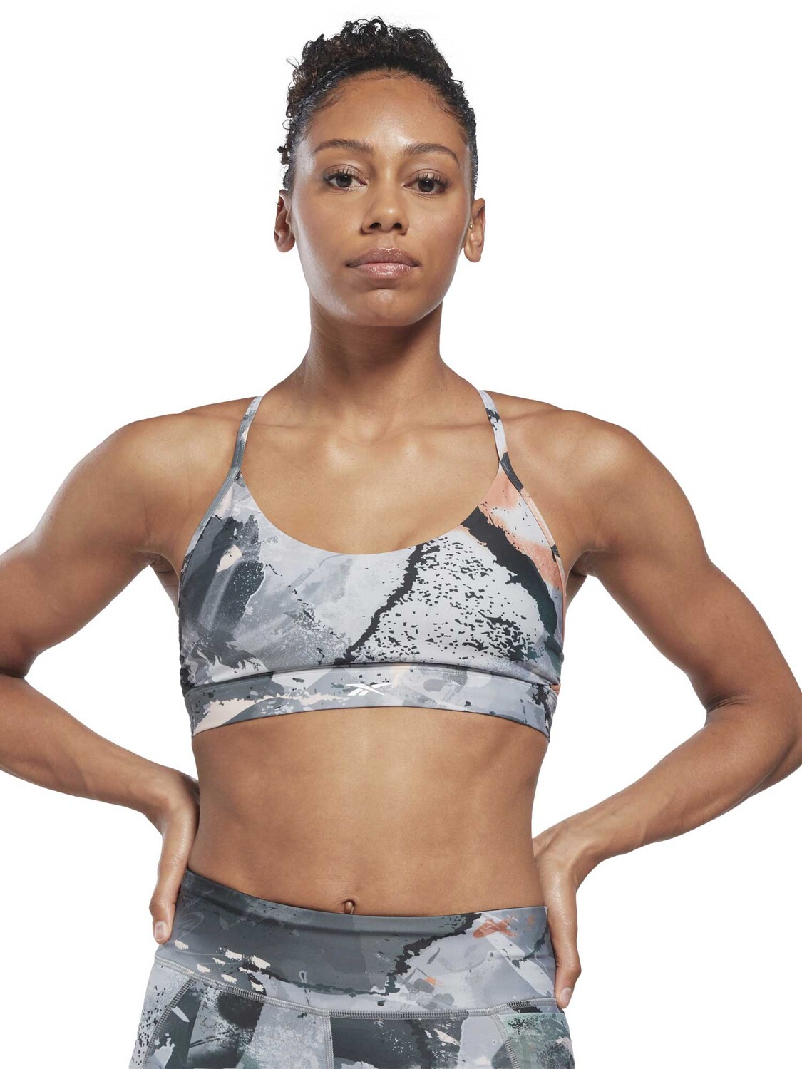 

Спортивный бюстгальтер Reebok Lux Strappy Allover Print Bold Bra, серый