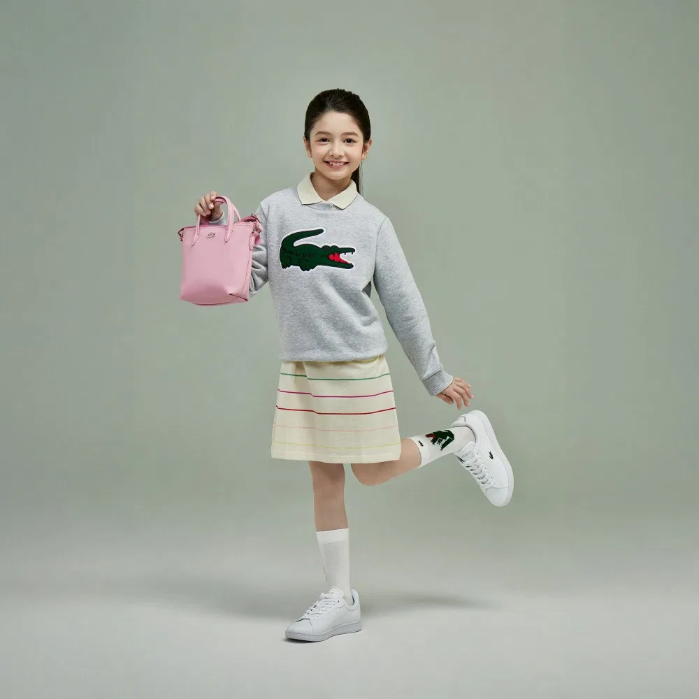 Детское платье в цветную полоску кремового цвета от Lacoste