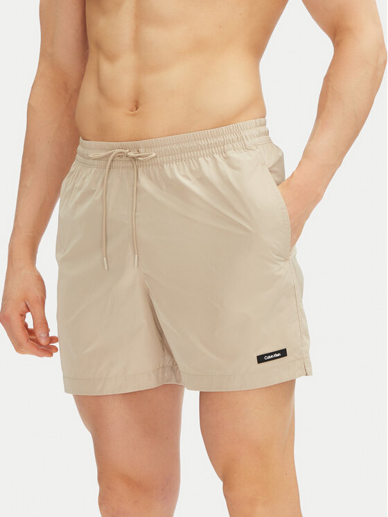 

Плавки-Шорты обычного кроя KM0KM01111 Calvin Klein Swimwear, бежевый
