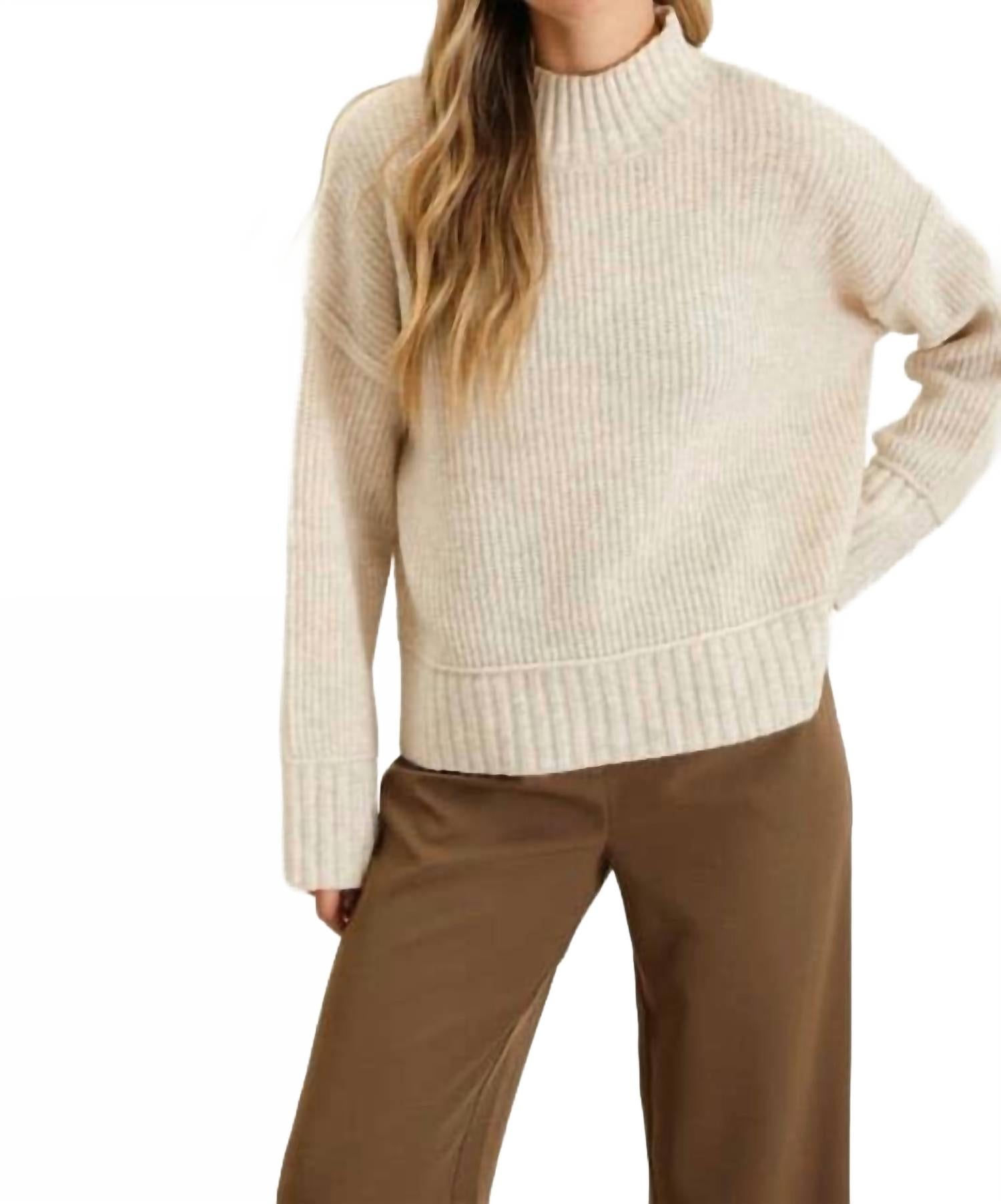 

Вязаный свитер с высоким воротником в кремовом цвете Blu Pepper