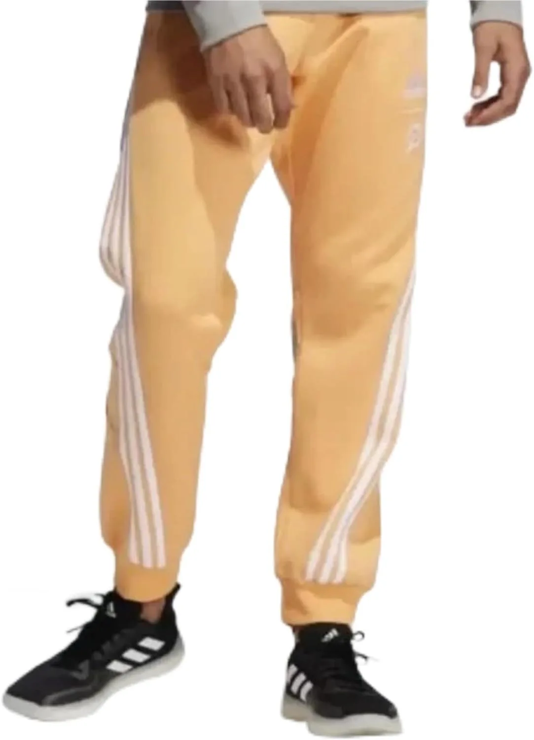 Спортивные брюки Adidas X Peloton Unisex Go Retro, цвет «кислотно-оранжевый»
