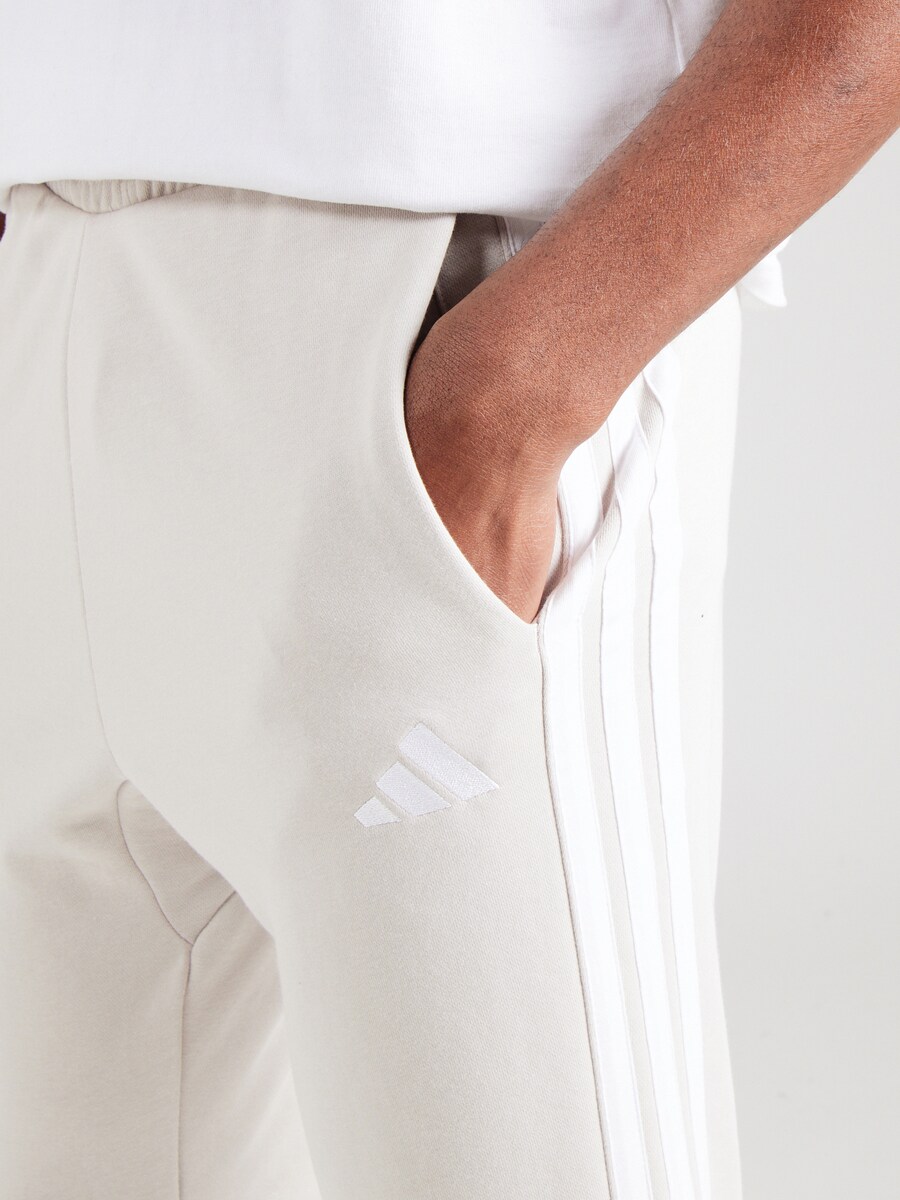 Зауженные тренировочные брюки ADIDAS SPORTSWEAR Essential, светло-бежевый — фото 3