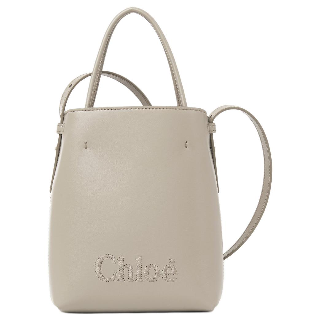 

Сумка-шоппер Chloé из телячьей кожи через плечо на ремне микро женская серо-бежевая