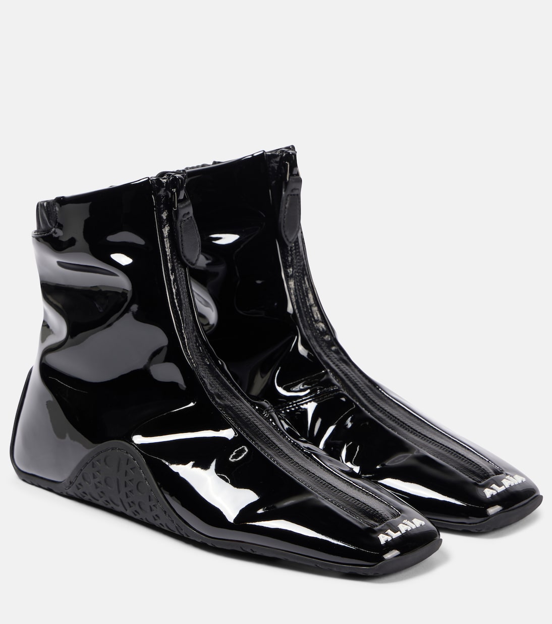 Кроссовки на шнуровке из искусственной лаковой кожи Alaïa, нуар