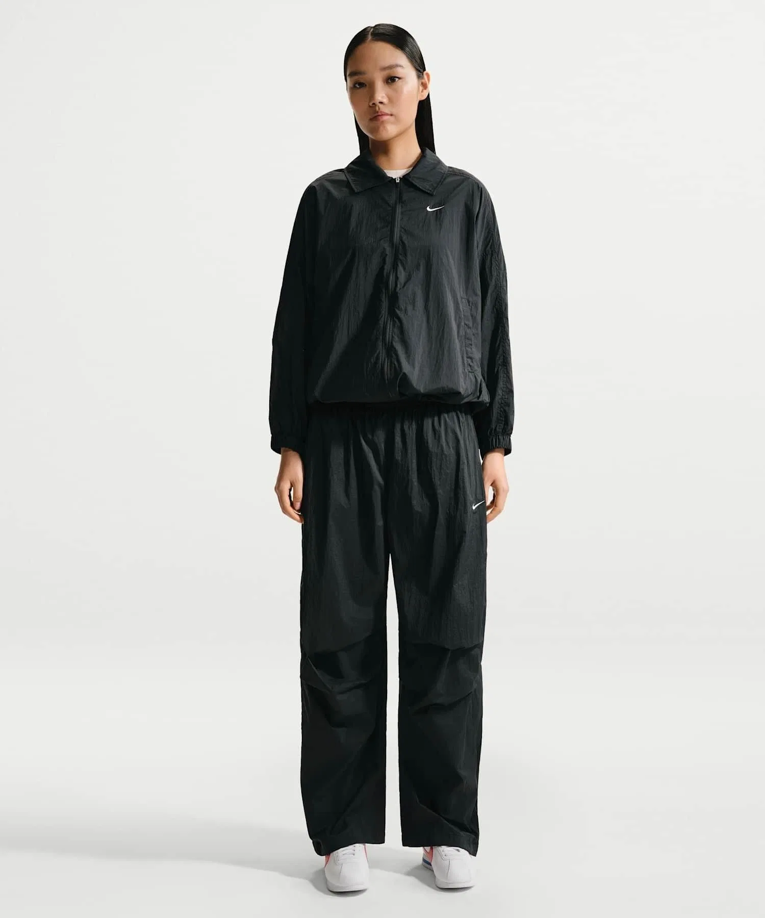 Женские UV брюки Nike Sportswear из нейлона чёрные