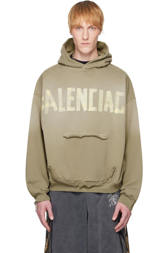 

Зеленая толстовка с капюшоном и рваными карманами в виде ленты Balenciaga