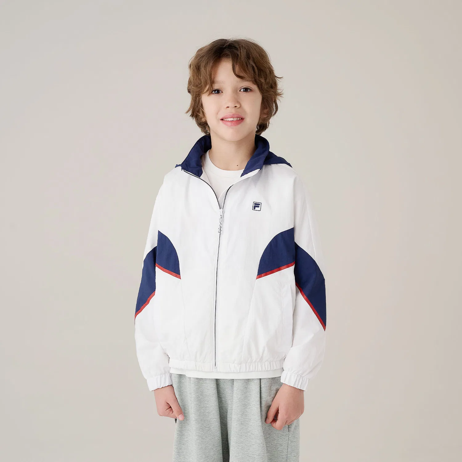 Детская ветровка с V-образными сетчатыми вставками белая от Fila Kids