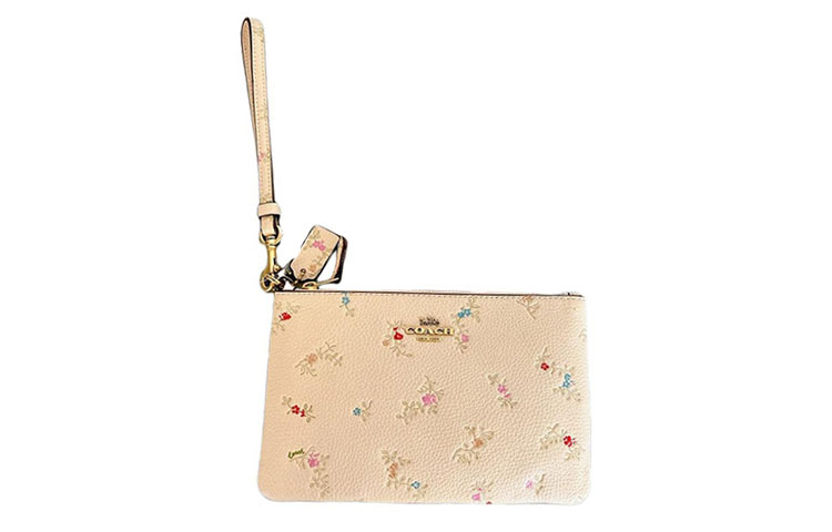 

Кожаный клатч-браслет Trumpets для женщин светло-розовый COACH